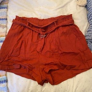Dark orange flowy shorts from garage